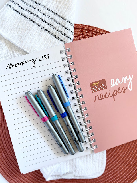 Meal Planner & E-Cookbook Black Friday Sale Pens laying on open meal planner