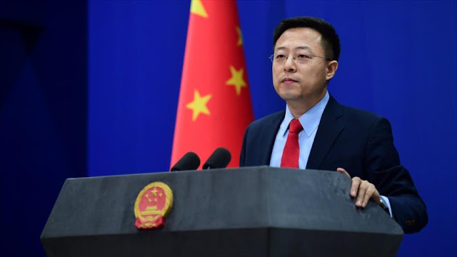 China insiste en que COVID-19 fue llevada por EEUU a Wuhan 