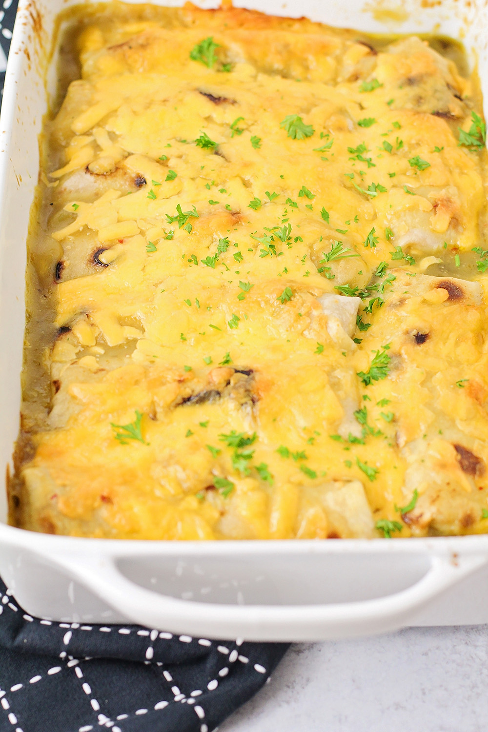These creamy chicken and vegetable enchiladas are an easy and delicious dinner the whole family will  love!