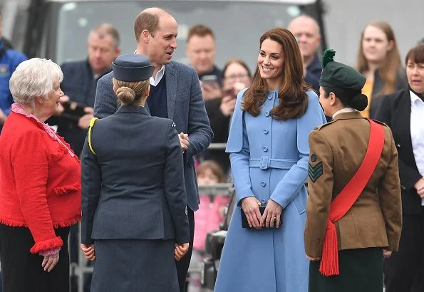 Kate Middleton wore Mulberry blue Ashleigh cape coat and a new Jenny Packham dress.The Duchess is wearing a cape coat by Mulberry