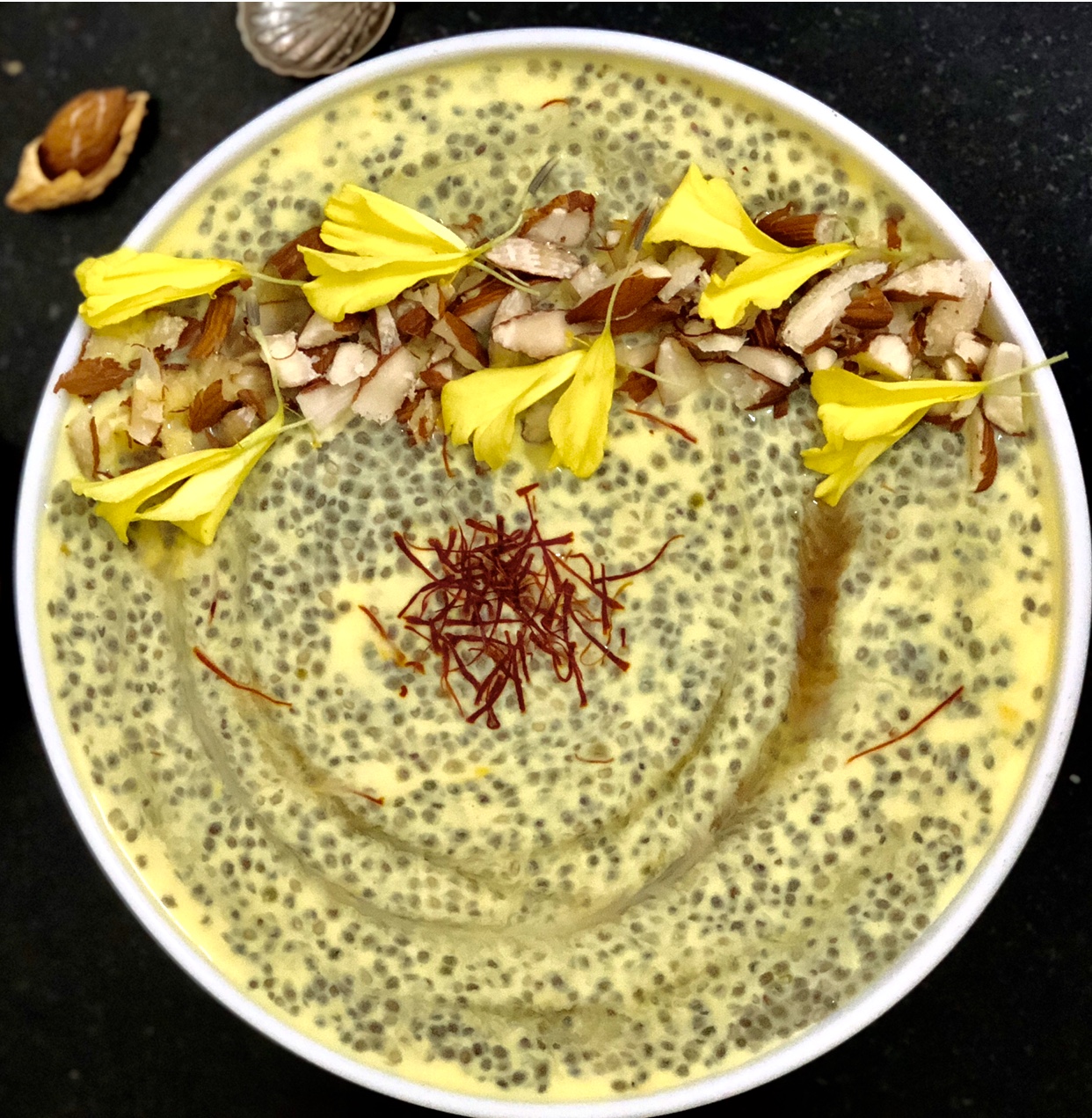 Chia pudding with saffron milk and almonds