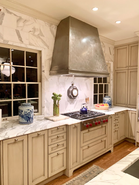 Luxurious classic traditional white kitchen with calacatta marble.