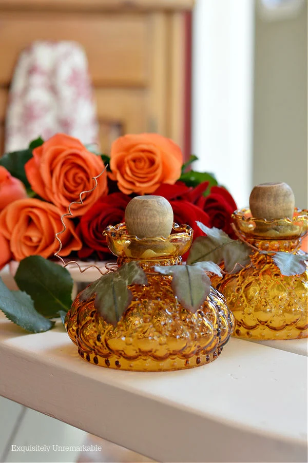 Hurricane Junk Pumpkins with orange and red roses