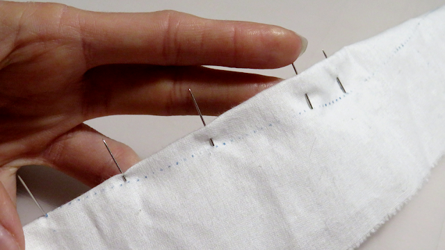 Alfileres colocados en la pinza por el lado opuesto