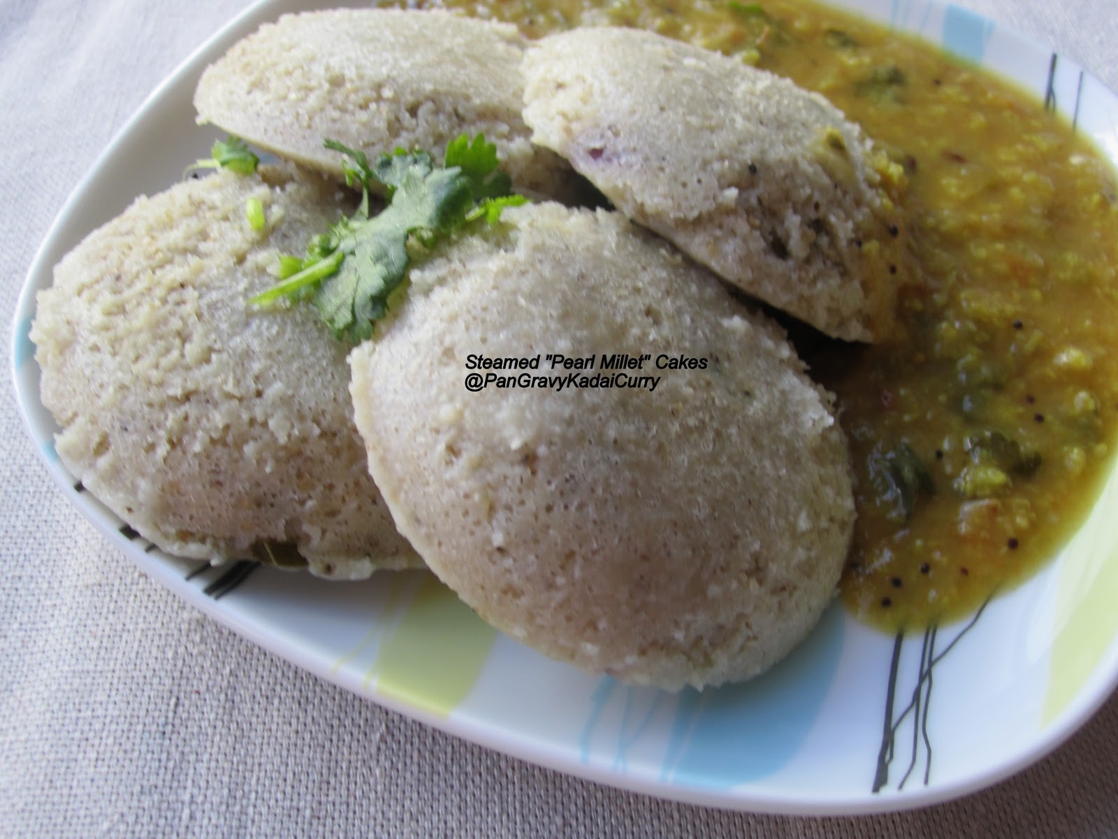 Pan Gravy Kadai Curry Steamed PearlMillet Cakes "Bajra/Kambu Idli" With Smashed Eggplant and