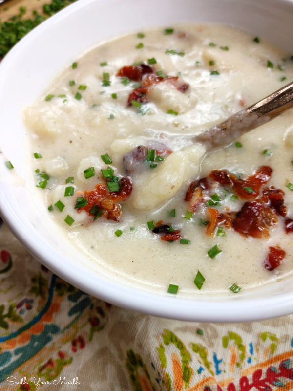 Perfect Potato Soup! A thick and hearty recipe for creamy potato soup with hints of smoky bacon perfectly seasoned and layered with flavor.