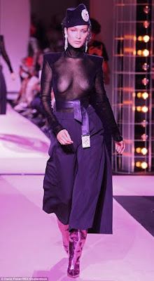 b Bella Hadid flashes her entire breasts in sheer top on Paris runway