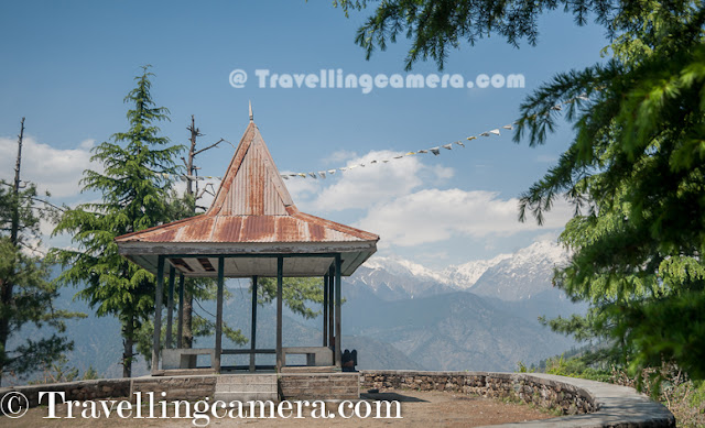 Recently some of us were on Kinnaur Trip and there is place called Jeory on the way. Sarahan is approximately 30 kilometers from Jeory and it's a beautiful town located on hill-top with amazing views of snow covered hills of Kinnaur. Bheemakali temple of Sarahan is most popular place to visit and this Photo Journey shares some of the moments spent around Bheema Kali Temple.Bheema Kali Temple has a huge campus and different temples inside the campus. There are two main temples, out of which one is accessible to everyone during normal days.The Second one is opened on some special occasions and Devi only allows Raja Virbhadra Singh to open the door of that temple. Shri Bheema Kali Temple is located in Sarahan town of Himachal Pradesh in India which is dedicated to the mother goddess Bhimakali, presiding deity of the rulers of former Bushahr State. The temple is situated about 180 km from Shimla and is one of 51 Shakti Peethass. The temple complex has another three temples dedicated to Lord Raghunathji, Narsinghji and Patal Bhairva Ji (Lankra Veer) - the guardian deity.Architecture of Bheema Kali Temple is beautiful. Whole campus is built with Stone and wooden blocks. It seems some part of the campus has not even cement to fix the joints. Whole campus is very well maintained and there is enough security as well.Here is one of the doors of the Bheem Kali temple in Sarahan Town. It's made up of silver with beautiful carving. There is also some text written, mostly in Hindi and Tibbatian scripts. Most of the carved forms are different gods and linked through some old stories.Sarahan was the capital of rulers of former Bushahr State. Bushahr dynasty earlier used to control the state from Kamroo. The capital of state later was shifted to Sonitpur. Later Raja Ram Singh made Rampur as the capital. It is believed that the country of Kinnaur was the Kailash mentioned in Puranas, the abode of Shiva. With its capital at Sonitpur this former princely state was extended up to entire area of Kinnaur where for sometimes Lord Shiva disguised himself as Kirata. Today, the then Sonitpur is known as Sarahan. Banasura, the ardent devotee of Lord Siva, eldest among the one hundred sons of great ablative demon King Bali and the great grandson of Vishnu votary Prahlad, during the Puranic age was the ruler of this princely state.(Courtesy - http://en.wikipedia.org/wiki/Bhimakali_Temple)According to a legend, the manifestation of the goddess is reported to the Daksha-Yajna incident when the ear of the Sati fell at this place and became a place of worship as a Pitha - Sthan. Presently in the form of a virgin the icon of this eternal goddess is consecrated at the top storey of the new building. Below that storey the goddess as Parvati, the daughter of Himalaya is enshrined as a divine consort of Lord SivaThere is a small market around Bheema Kali Temple and there are enough shops to have lunch or light snacks. Apart from that local caps can be bought from this fellow. He was very welcoming and offered good discounts for us :). We had asked for rates in Rampur Market, but he had better stuff and reasonable prices. There are many other shops in the town where some local stuff can be procured. On top of all that, most of the folks were really sweet to interact with.During our visit, we were looking for ladies wearing Dhaatu but couldn't gain the courage to ask anyone to get clicked by us. And just outside the Bheema Kali temple, this lady asked us to click one of her photograph and show her how we click. Probably she was noticing us clicking & reviewing photographs around the temple. We clicked few shots and showed to her. She shared some tips to improve and finally approved few of the shots. After final approval, she invited us to her hotel nearby but we couldn't go because it was time to head back as we had booked guest-house in Jeory.Here is a nearby sight, which is popularly known as Hawa-Ghar. This point has very clear view of Kinnar-Kailash Hills and place was quite windy. We spent around 30 minutes here to enjoy the breeze and take rest. This place is isolated form hustle bustle of the town. When we reached, there was only one person sitting here. Probably this place was least used by localites, as everyone has Hawa-ghar around their own houses :)Whole place was surrounded by Pine or Deodar Forests and smell was awesome in the middle of these forests. It was really an amazing experience to roam around Bheema Kali Temple and Sarahan Town. Meeting different people, visiting one of the amazing temples in this region, Hawa Ghar, a huge house of old kingdom etc.The town Sarahan is known as the gateway of Kinnaur. Down below at a distance of 7 km from Sarahan is the River Satluj. Sarahan is identified with the then Sonitpur mentioned in Puranas.Before entering into the main temple, everyone needs to lock mobiles, wallets or anything else which is made of leather and then wear a cap. Above photograph shows Aneesh wearing the holy cap and standing on right side of lockers everyone gets to keep everything safe.