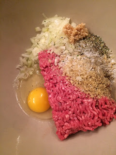 ground beef, eggs, onions, bread crumbs, and spices