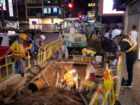 construction crew at an excavation next to Dundas Street in Hong Kong