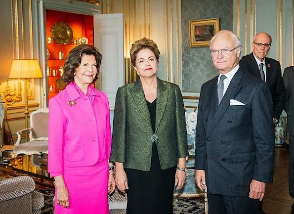 King Carl Gustaf of Sweden and Queen Silvia of Sweden met with President Dilma Rousseff of Brazil wore Prada dress