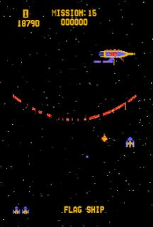 A clip of gameplay from the fifth stage of Gorf, where the player faces a boss starship behind a protective shield.