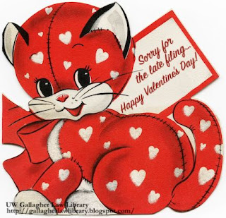 Vintage valentine of cartoon red stuffed toy kitten, covered in white heart-shaped spots, with a red bow around the neck, holding a gift tag that reads "Sorry for the late filing… Happy Valentine's Day!"