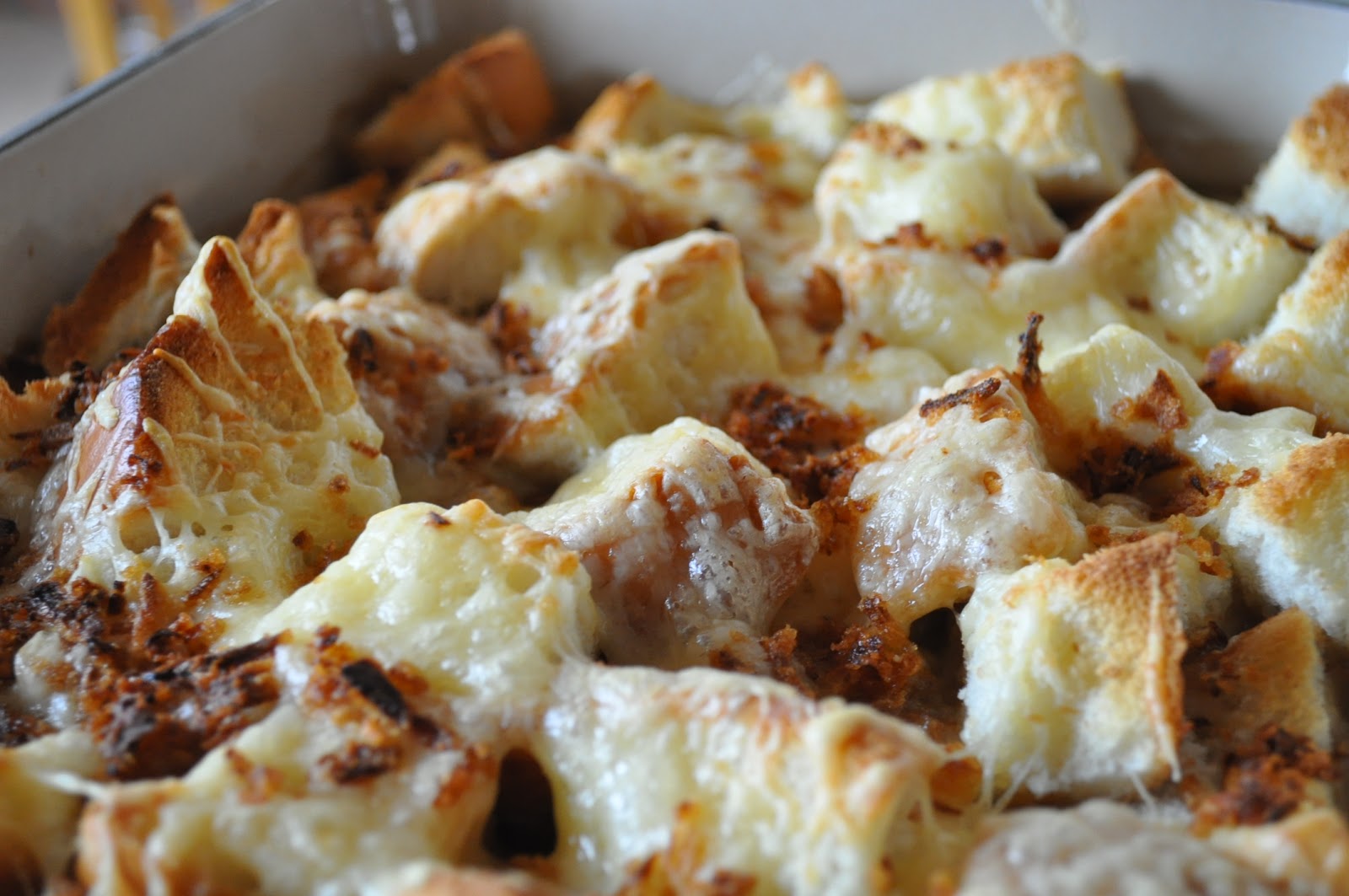 Close-up photo of french onion in a casserole.