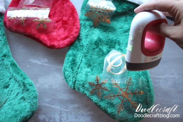The Cricut EasyPress Mini Raspberry is perfect for this craft because it is easy to control where the heat is. A large press would easily melt the fur of the stockings.