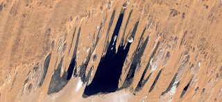 The mouth of terror,abstract landscapes of deserts ,Abstract Naturalism,abstract photography deserts of Africa from the air,abstract surrealism,mirage in desert,fantasy forms of stone in the desert The mouth of terror,abstract landscapes of deserts ,Abstract Naturalism,abstract photography deserts of Africa from the air,abstract surrealism,mirage in desert,fantasy forms of stone in the desert