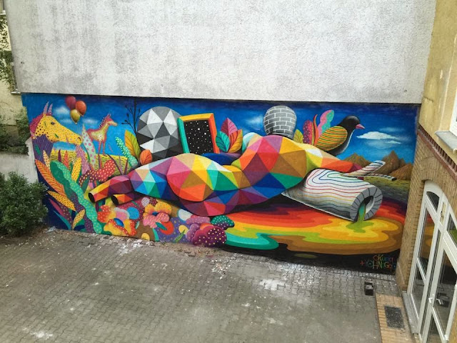 Okuda has now landed in Berlin, Germany where he's been rather busy with two brand new pieces that just popped up in the city.
