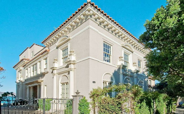 exterior view of a mansion in San Francisco with a patio and a backyard