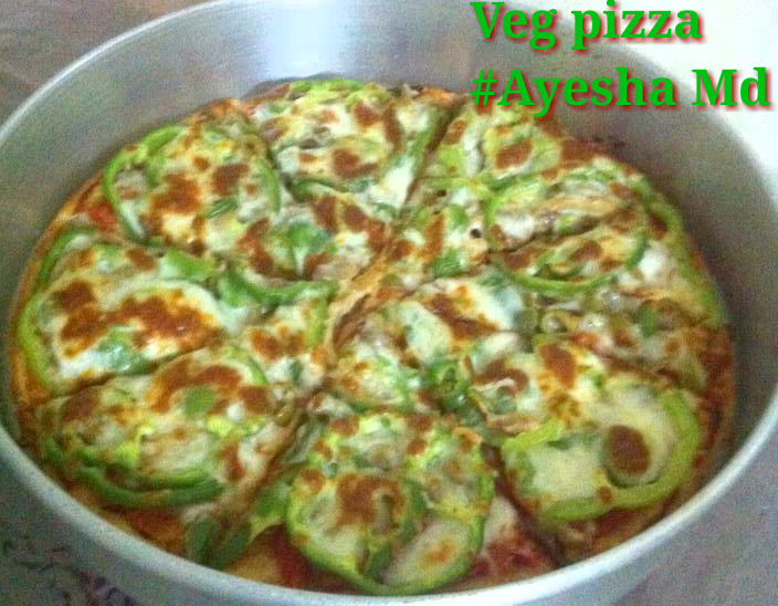 4 Foodies Veg Pizza in oven.....Homemade (Dough and Pizza Sauce)
