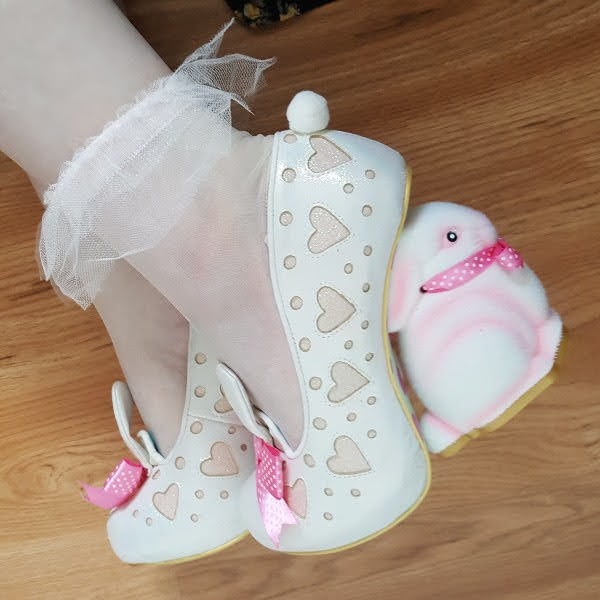 close up wearing organza frill ankle socks and fuzzy bunny heeled shoes