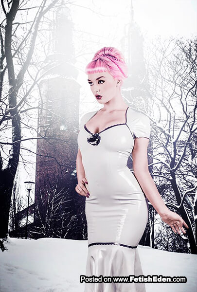 White latex dress lady with pink hair outdoors in winter