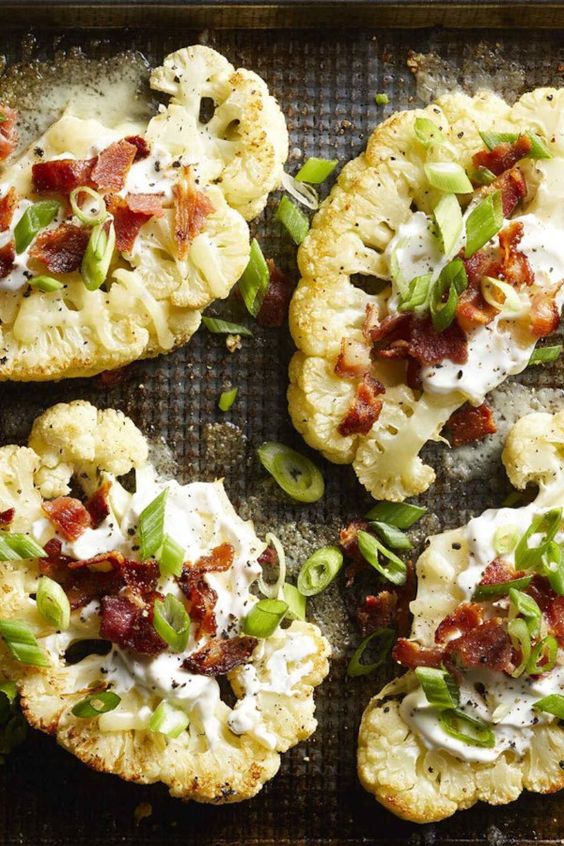 Crispy slices of roasted cauliflower topped with cheese, sour cream and bacon make a tasty low-carb alternative to classic loaded potato skins.