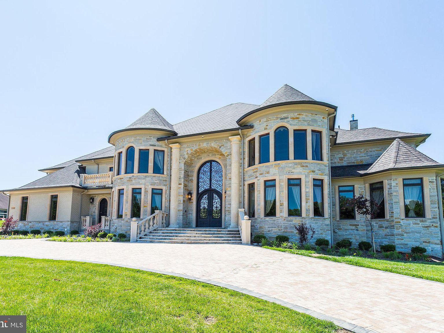 THE AMERICAN MANION 15,000 Square Foot ColonialStyle Stone and Brick