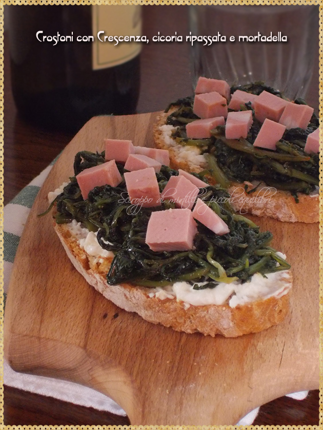 Crostoni con Crescenza, cicoria ripassata e mortadella