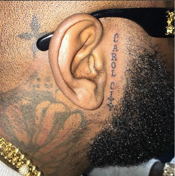 Rick Ross Gets New Tattoos On His Forehead & Face (See Photo)