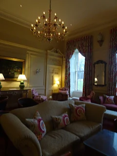 stunning vintage living room in stobo house with grand chandeller