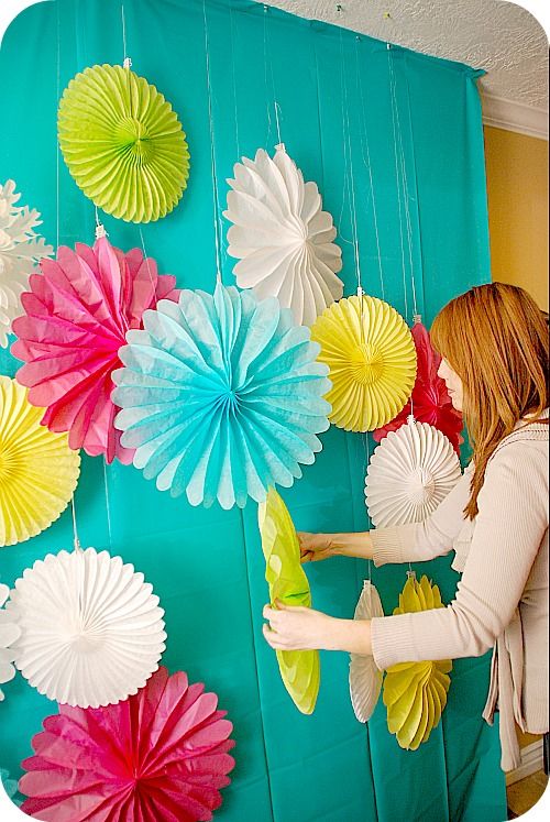 plastic tablecloths and paper fans...cute & colorful...but also c