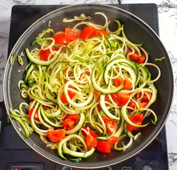 Learn how to make spiralized zucchini with garlic and parmesan that is so satisfying and delicious and makes an amazing keto dish!