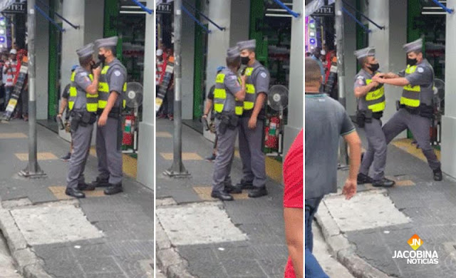 PM aponta arma para rosto de colega no centro de São Paulo; assista
