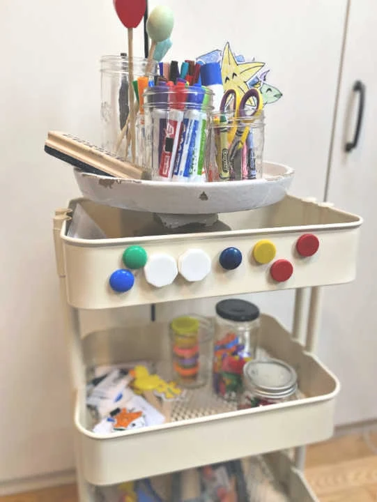 A rolling cart filled with supplies
