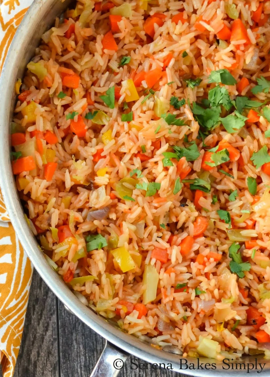 Authentic Restaurant Style Mexican Rice recipe is an easy family favorite! A must for your next Mexican food night from Serena Bakes Simply From Scratch.