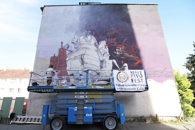 Street artist roem and sepe work in progress in slovakia