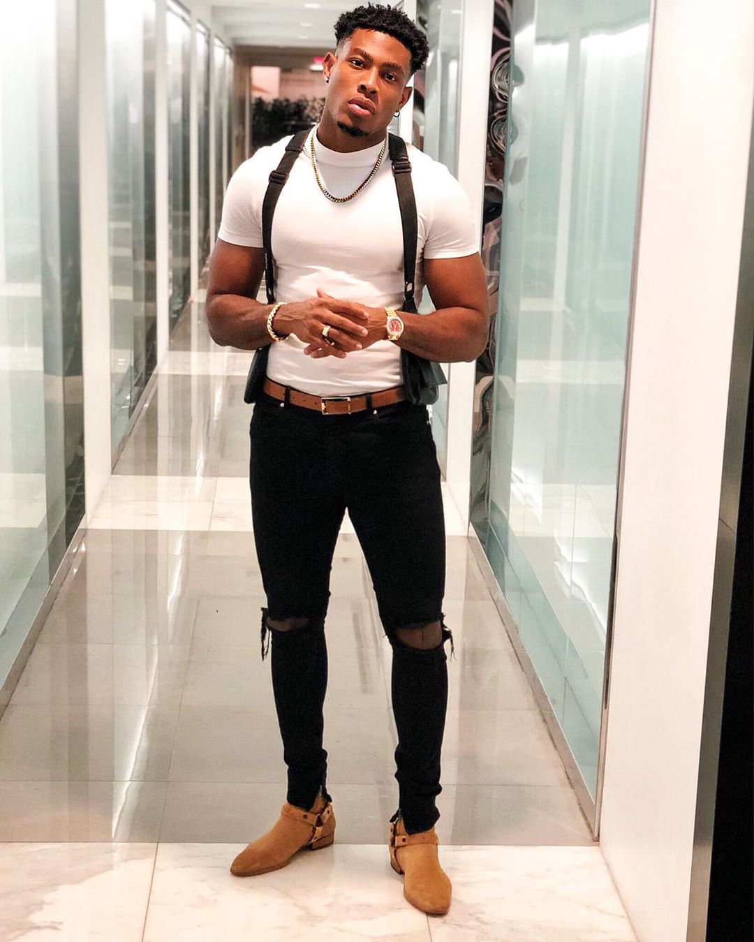 Pictures of Caesar Chukwuma standing tall