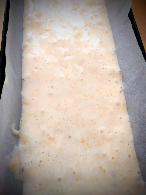 Line a baking tray and fill it with the cake mixture