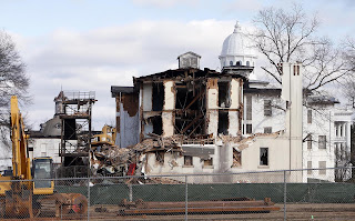 An image of demolishment of Jemison Center or Old Bryce Hospital with crane