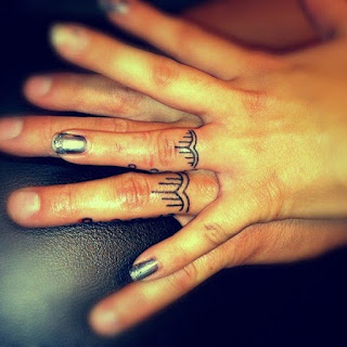 finger band tattoos