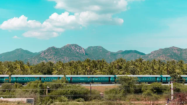 Train by the mountains