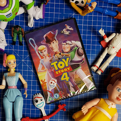 Toy Story 4 DVD review and giveaway pack shot with toys around