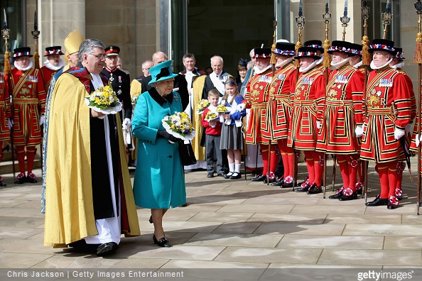 Queen Elizabeth II walks with the Dean of Sheffield Peter Bradley as she leaves Sheffield Cathedral for the traditional Royal Maundy Service at Sheffield Cathedral 