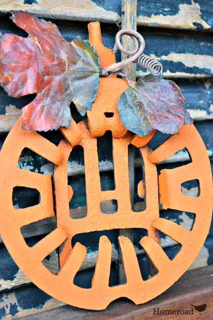 rustic grate pumpkin with leaves and tendril