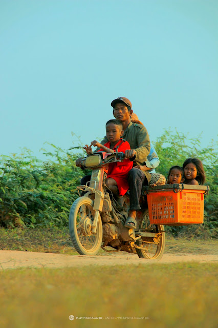 A family on one motorbike