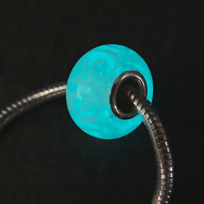 Handmade lampwork glass silver core big hole charm bead by Laura Sparling made with CiM Glow in the Dark