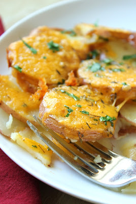 Oven Chipped Potatoes from Delicious as it Looks cheesy oven chipped potatoes