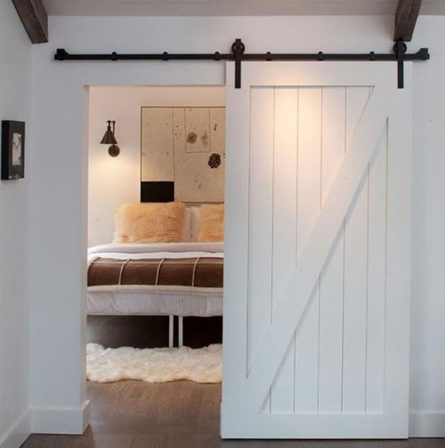Content in a Cottage Sliding Barn Door for Bedroom