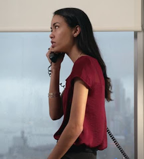 young business woman answering phone Shutterstock