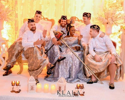 Photos: White groom and his men rock Efik traditional attire to his wedding with Nigerian bride